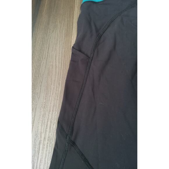 Lululemon leggings speed up lights out black teal eyelet lzip pocket side size 4 - Picture 5 of 6